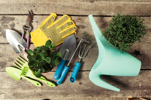 Gardener working safely with tools in a managed outdoor space