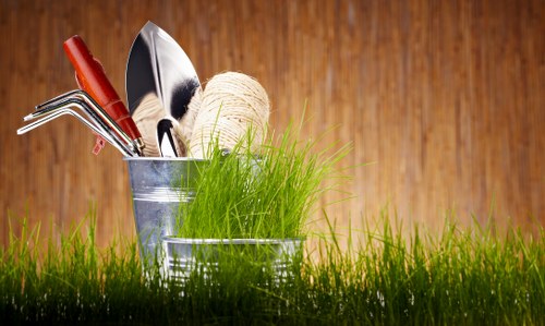 Clearing leaves, branches, and garden waste during a property tidy-up in Upminster Bridge